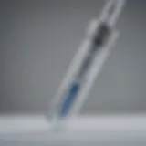 The Pfizer-BioNTech vaccine vial with a syringe