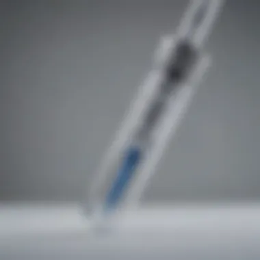 Pfizer-BioNTech Vaccine Administration The Pfizer-BioNTech vaccine vial with a syringe
